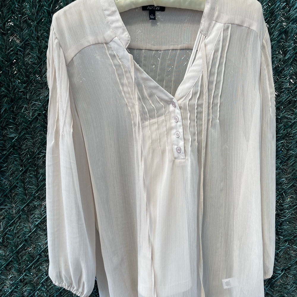 Sheer Ivory blouse with cream camisole underneath. Beautiful, bohemian.